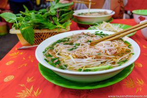 Ein typisch vietnamesisches Frühstück - Pho Bo, oder auch Nudelsuppe genannt.